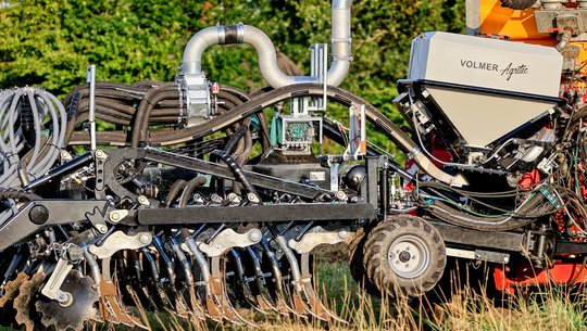 VARIOMAX Gülleverteiler am Mulchgrubber